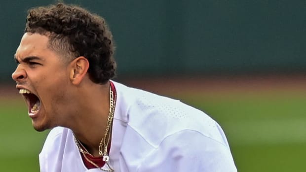 Razorbacks Jayson Jones celebrates during sixth-inning rally on Tuesday.